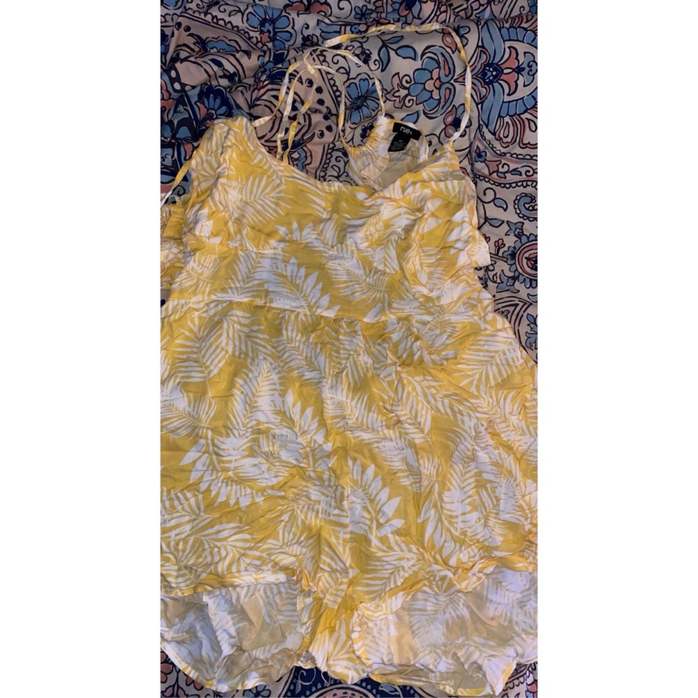 Yellow romper that is backless